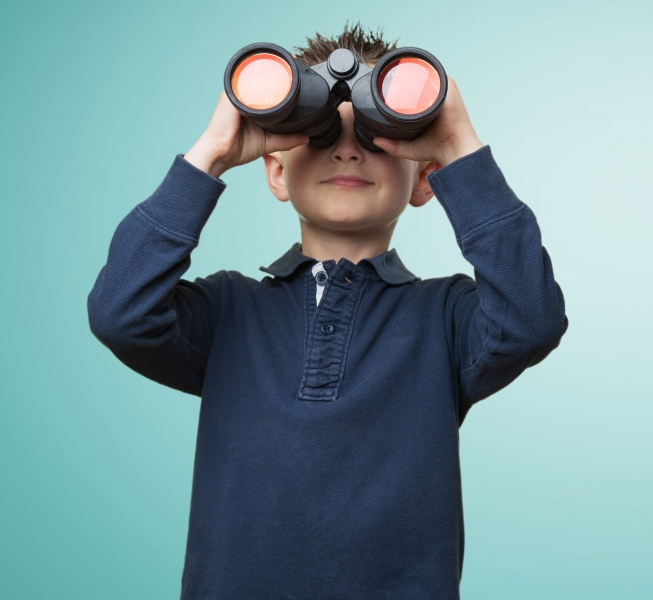boy-looking-through-binoculars